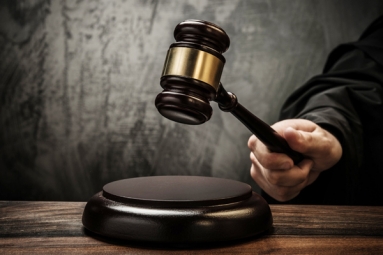 Indian-origin charged for impersonating US tax official Indian-origin charged for impersonating US tax official