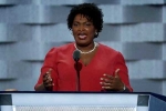 state flag, abrams, stacey abrams helped torch state flag during college protest, Georgia governor
